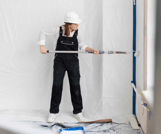 Person pointing at building